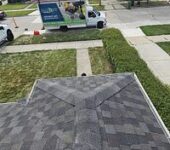 Hip roof shingle installation by AllPoint Construction