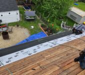 Roof decking installation in progress by AllPoint Construction
