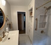 Bathroom remodel with walk-in shower and vanity by AllPoint Construction