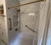 Walk-in shower installation during bathroom remodel by AllPoint Construction