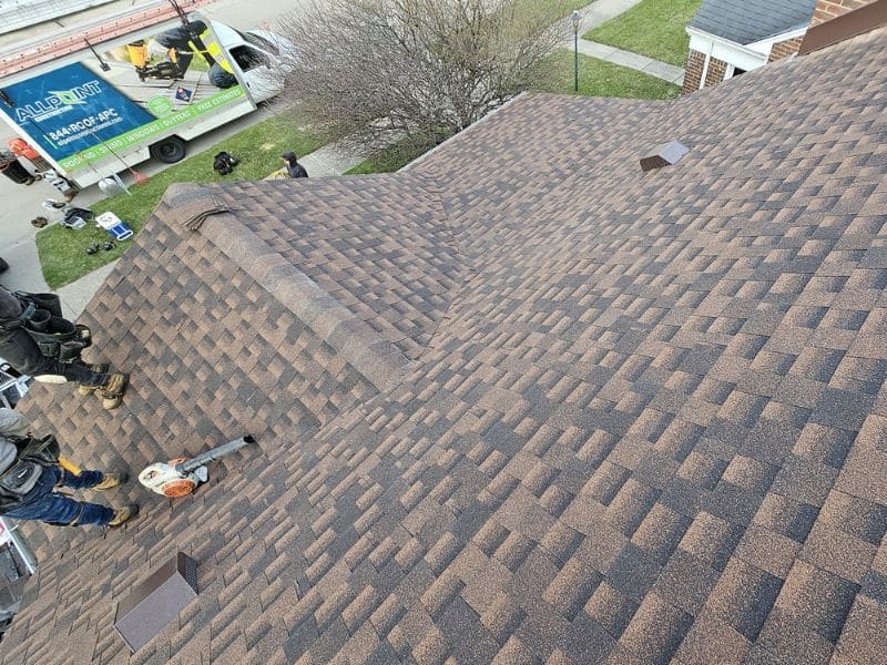 Old worn shingle roof in Southgate before replacement by AllPoint Construction