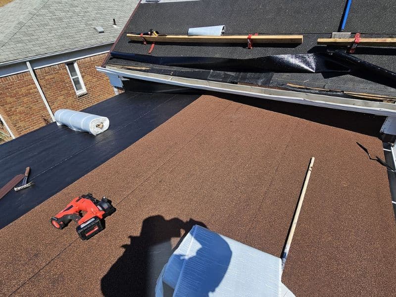Roof in Wyandotte showing storm damage before repair by AllPoint Construction