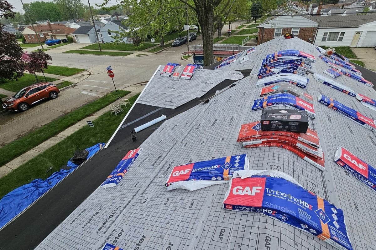 Roof underlayment and flashing exposed during professional repair to prevent future leaks